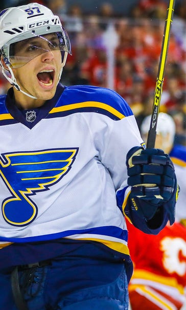 Perron collects hat trick as Blues defeat Flames 6-4